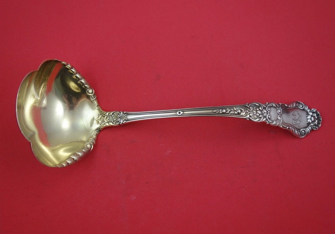 Gorham Baronial Old Sterling Silver Oyster Ladle Gold Washed 11 1/4": Gorham Baronial Old Sterling Silver Oyster Ladle Gold Washed 11 1/4" This exquisite oyster ladle from the Baronial Old pattern by Gorham is a fine example of sterling silver craftsmanship. Measuring 1