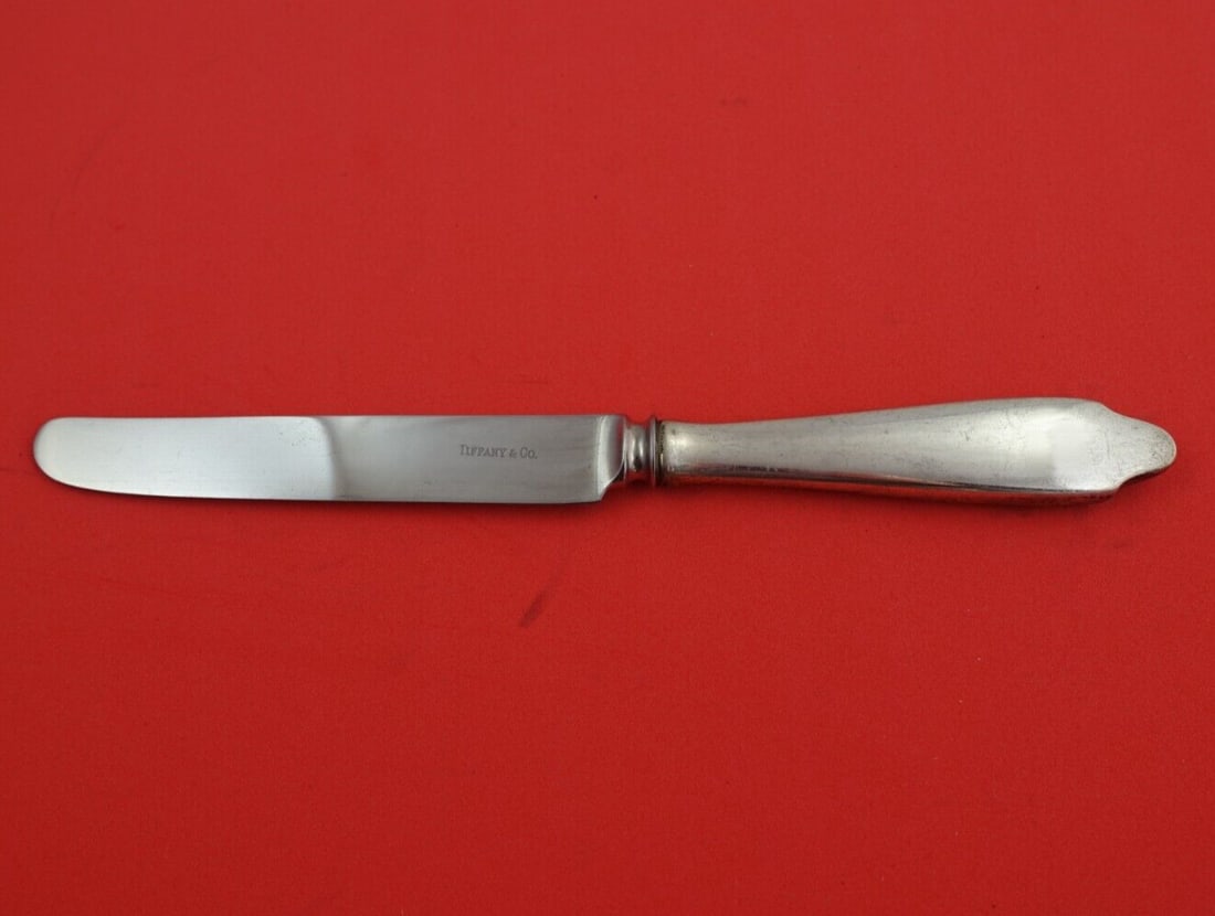 Tiffany & Co Clinton Sterling Silver Dessert Knife 7 3/4 French Blade: Tiffany & Co Clinton Sterling Silver Dessert Knife 7 3/4 French Blade This exquisite dessert knife is part of the Clinton pattern by Tiffany & Co. Crafted from sterling silver, it features a hollow ha