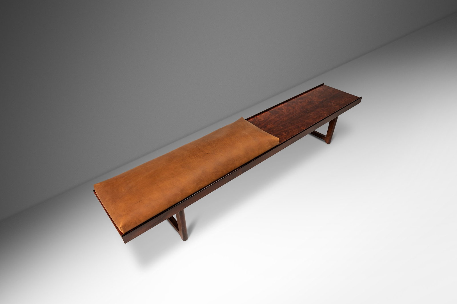Rare Torbjorn Afdal Krobo Rosewood Bench with Leather Seat Norway 1960s: Rare Torbjorn Afdal Krobo Rosewood Bench with Leather Seat Norway 1960s This stunning Mid-Century Modern long "Krobo" table/bench, designed by the renowned Torbjorn Afdal for Bruksbo, showcases a beau