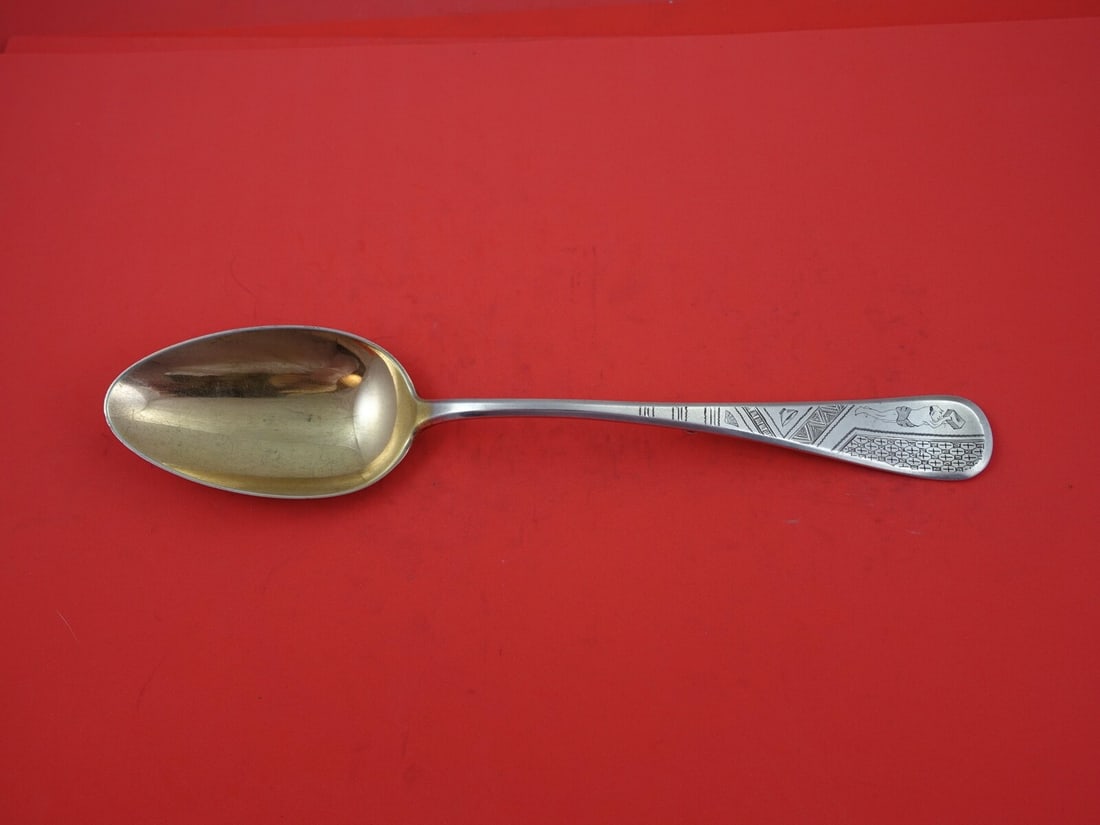 Tiffany & Co King William Engraved Sterling Silver Stuffing Spoon 11 1/8": Tiffany & Co King William Engraved Sterling Silver Stuffing Spoon 11 1/8" Discover the elegance of the King William Engraved Stuffing Spoon by Tiffany & Co. This exquisite serving spoon features intri