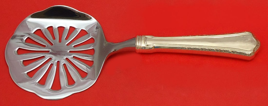 Madison by Wallace Sterling Silver Custom Tomato Server 8.5": Madison by Wallace Sterling Silver Custom Tomato Server 8.5" This Madison by Wallace tomato server is a stunning piece crafted from sterling silver. Featuring a hollow handle with a stainless implemen