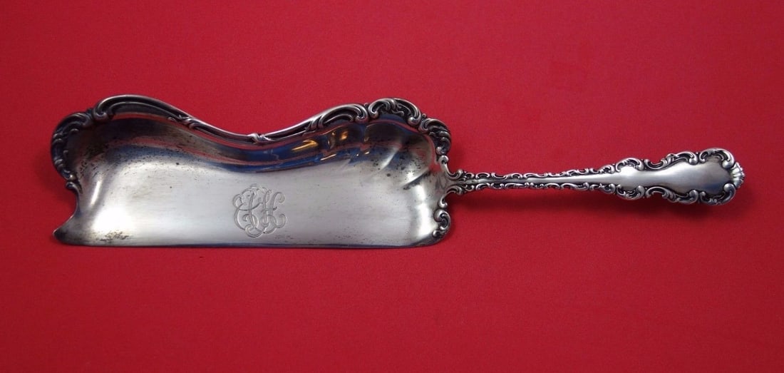 Whiting Louis XV Sterling Silver Crumber 10.5 Inch Monogrammed: Whiting Louis XV Sterling Silver Crumber 10.5 Inch Monogrammed This exquisite crumber, crafted in the elegant Louis XV pattern by Whiting, showcases the artistry of 19th-century sterling silverware. M