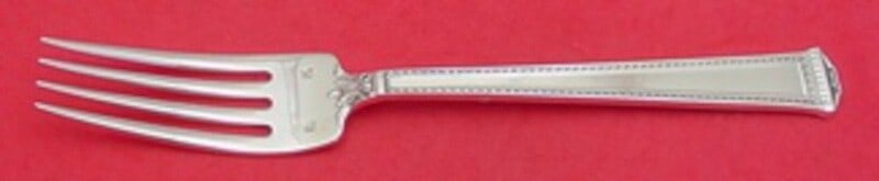 Tuttle Pantheon Sterling Silver Dinner Fork 7 3/4 Inch Flatware: Tuttle Pantheon Sterling Silver Dinner Fork 7 3/4 Inch Flatware Add elegance to your dining table with this exquisite sterling silver dinner fork from the Pantheon pattern by Tuttle. Measuring 7 3/4 i