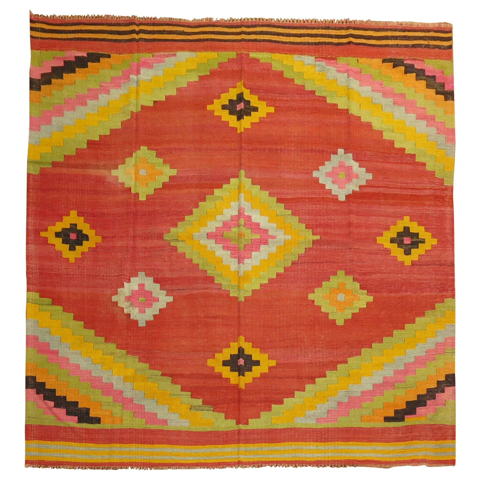 Hand Knotted Wool Turkish Anatolian Square Kilim 8'10 x 8'9: Hand Knotted Wool Turkish Anatolian Square Kilim 8'10 x 8'9 This handmade Turkish Anatolian square kilim from the 1960s features vibrant, bright colors and a distinctive bohemian style. Expertly craft