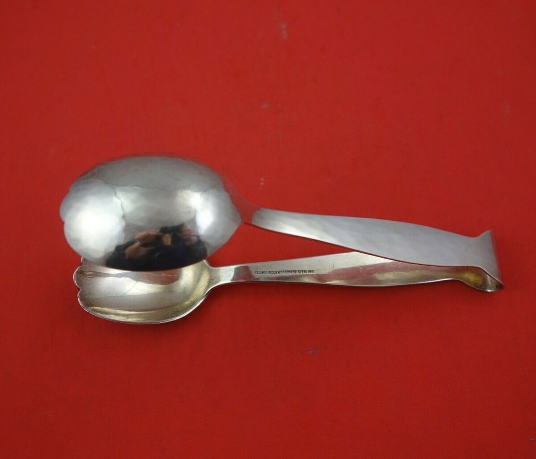 Allan Adler 7 Inch Sterling Silver Ice Tong Swedish Modern Design: Allan Adler 7 Inch Sterling Silver Ice Tong Swedish Modern Design Experience elegance with this 7" Sterling Silver Ice Tong designed by Allan Adler in the Swedish Modern pattern. Crafted from high-qua