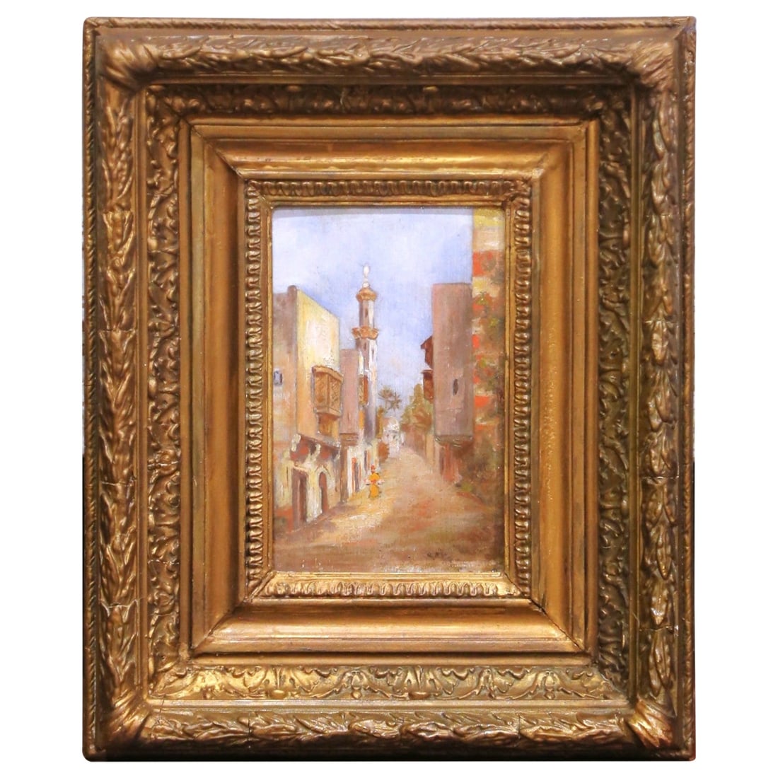 French village street oil painting gilt carved frame 14 x 11.5 in: French village street oil painting gilt carved frame 14 x 11.5 in This mid-19th century French oil on board painting depicts a quaint village street scene, featuring rustic buildings and a central tow