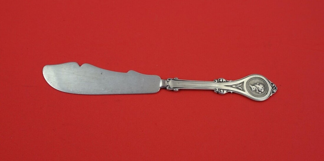 Sterling master butter spreader 7 in Sperry D Brower Medallion: Sterling master butter spreader 7 in Sperry D Brower Medallion Sterling silver master butter spreader in the Medallion pattern by Sperry D. Brower. It features a flat handle, measures 7 inches, and