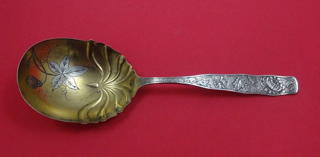 Towle Sterling Silver Berry Spoon Gold Washed Orchids Monogrammed Our Girls 8.5": Towle Sterling Silver Berry Spoon Gold Washed Orchids Monogrammed Our Girls 8.5" This elegant serving spoon, crafted by Towle, features a stunning gold-washed bowl adorned with intricate orchid design