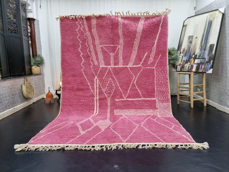 Authentic Soft Pink Handmade Moroccan Berber Wool Rug: Authentic Soft Pink Handmade Moroccan Berber Wool Rug Experience the elegance of this Luxurious Authentic Soft Pink Handmade Moroccan Berber Wool Area Rug. Skillfully handwoven in the Atlas Mountains 