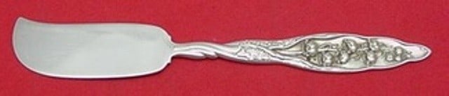 Whiting Sterling Silver Butter Spreader 5 3/4" Lily of the Valley Pattern: Whiting Sterling Silver Butter Spreader 5 3/4" Lily of the Valley Pattern This exquisite butter spreader, crafted by Whiting, features a beautiful Lily of the Valley pattern. Made from high-quality st