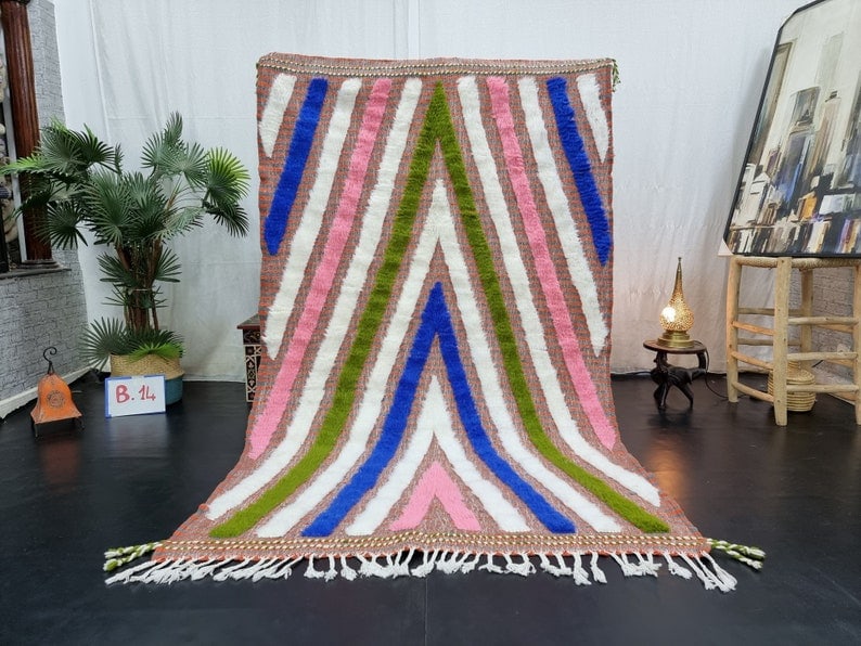 Artistic Handmade Moroccan Berber Wool Rug 10 x 5 Feet: Artistic Handmade Moroccan Berber Wool Rug 10 x 5 Feet Discover the elegance of this artistic handmade Moroccan Berber wool rug, meticulously crafted by local Berber women weavers using traditional to