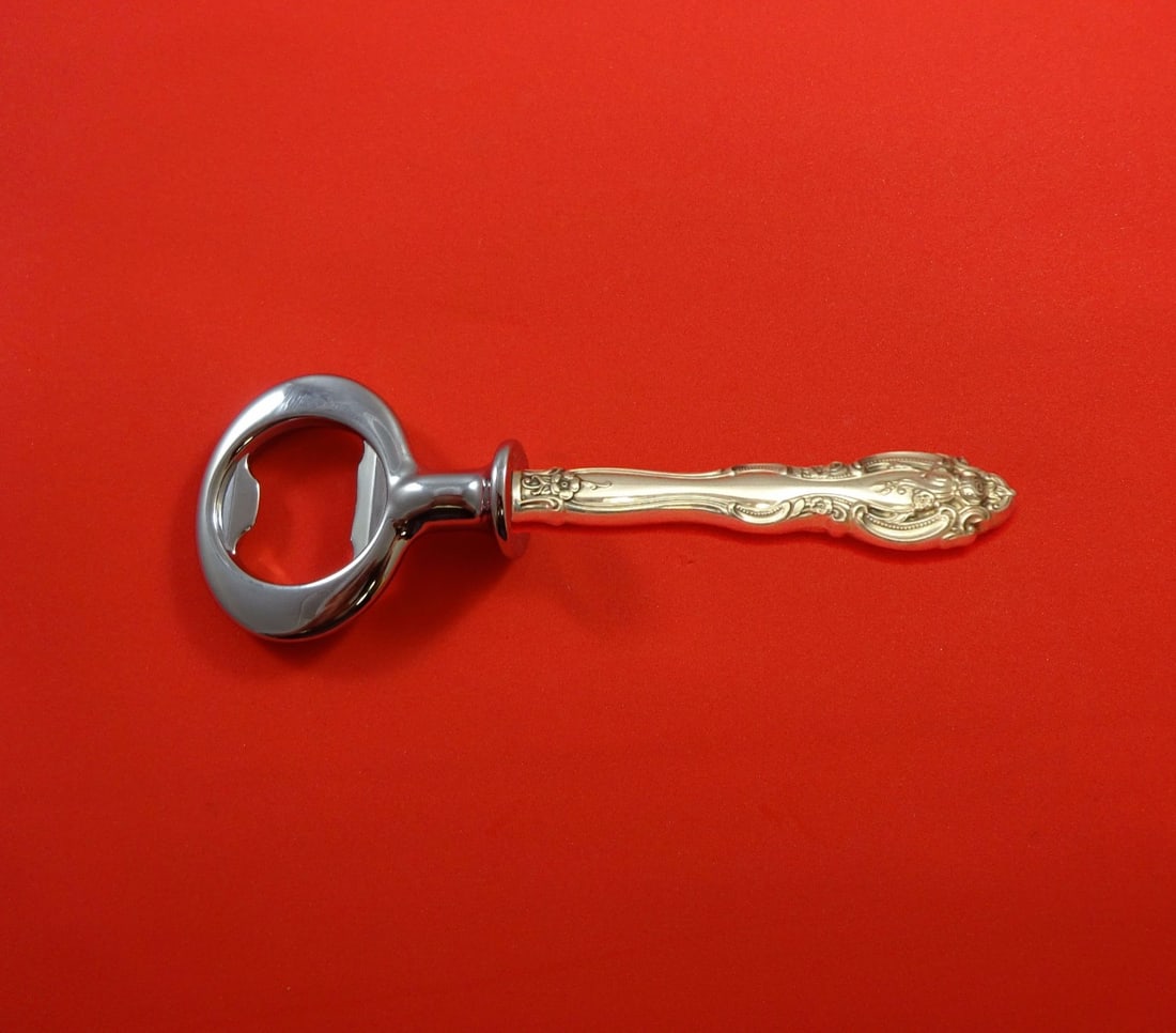 Gorham La Scala Sterling Silver Bottle Opener Custom Made 6": Gorham La Scala Sterling Silver Bottle Opener Custom Made 6" Experience elegance with the La Scala Bottle Opener by Gorham, crafted from sterling silver with a chrome-plated implement. This post-1940 