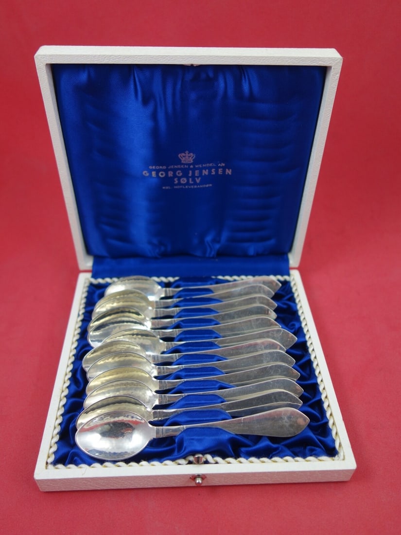 Georg Jensen Continental Sterling Silver 12pc Demitasse Spoon Set 4 1/4": Georg Jensen Continental Sterling Silver 12pc Demitasse Spoon Set 4 1/4" This exquisite 12-piece demitasse spoon set from Georg Jensen's Continental pattern is crafted in sterling silver, measuring 4 