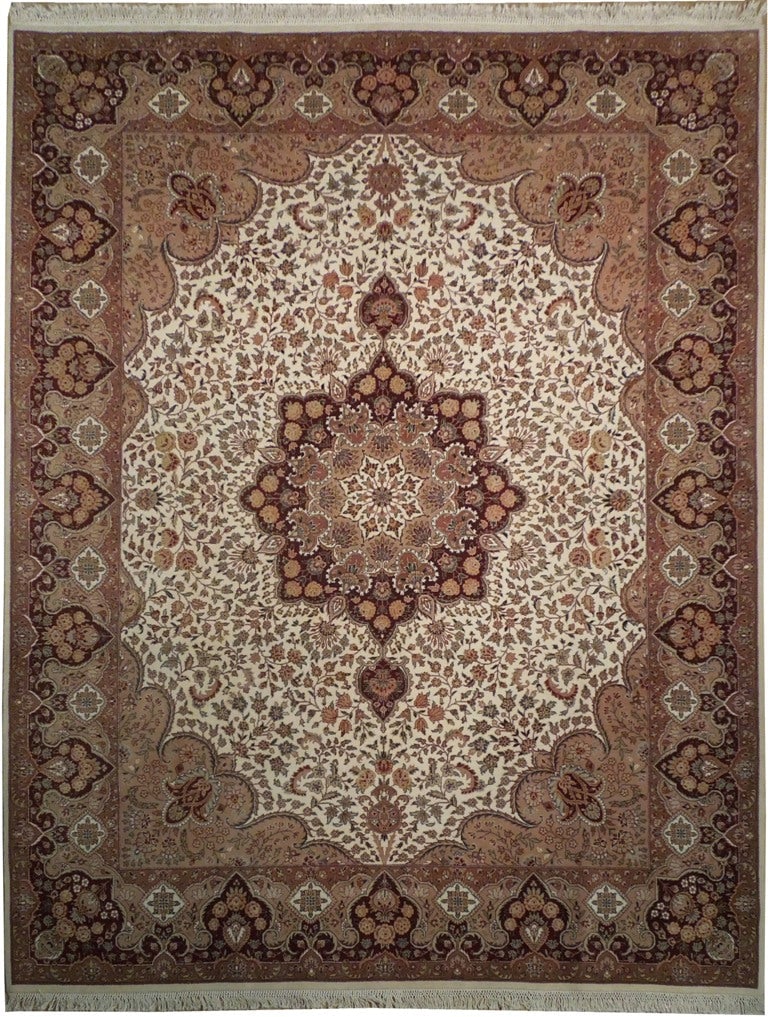 8 x 9.9 Persian Tabriz Hand Knotted Wool Silk Area Rug: 8 x 9.9 Persian Tabriz Hand Knotted Wool Silk Area Rug Free continental US Shipping This 8 x 9.9 foot Persian Tabriz area rug is hand-knotted by skilled artisans, blending high-quality wool with a cot