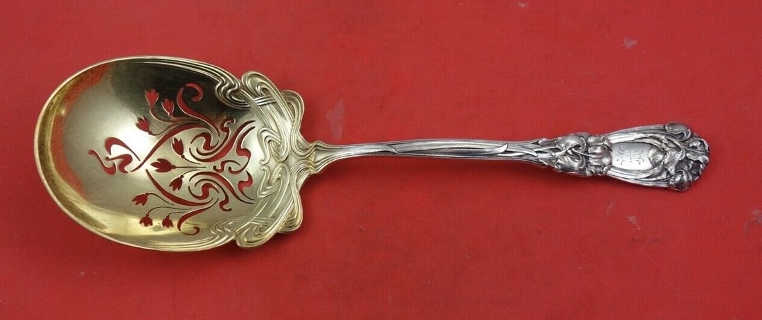 Durgin-Gorham Iris Sterling Silver Ice Spoon Gold Wash 9 3/4 Inch: Durgin-Gorham Iris Sterling Silver Ice Spoon Gold Wash 9 3/4 Inch This exquisite Iris ice spoon by Durgin-Gorham is crafted from sterling silver and features a beautiful gold wash finish. Measuring 9 