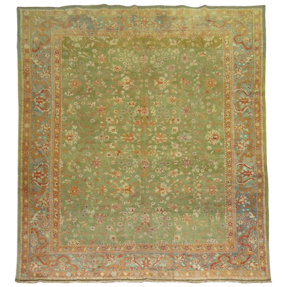 Zabihi Collection Antique Turkish Oushak Rug Green Wool Hand-Knotted 105 x 135: Zabihi Collection Antique Turkish Oushak Rug Green Wool Hand-Knotted 105 x 135 Discover the exquisite beauty of this fine antique Turkish Oushak rug, crafted in the early 20th century around 1910. Thi