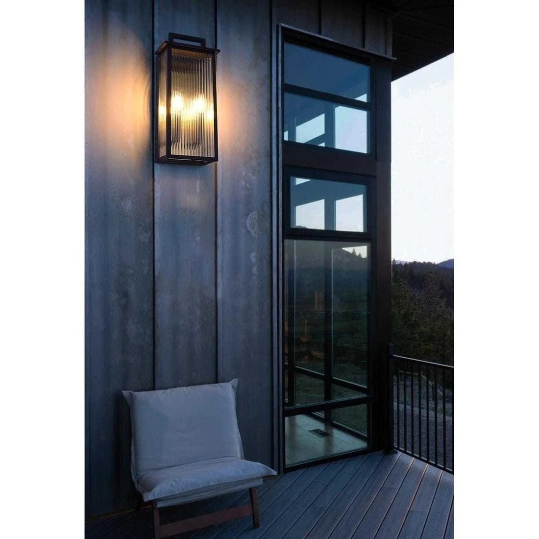 Kannon outdoor wall light black iron ribbed glass 18.9 in: Kannon outdoor wall light black iron ribbed glass 18.9 in Large outdoor wall sconce light fixture with a traditional style, made of iron and glass with ribbed glass and a black finish. It is hardwired