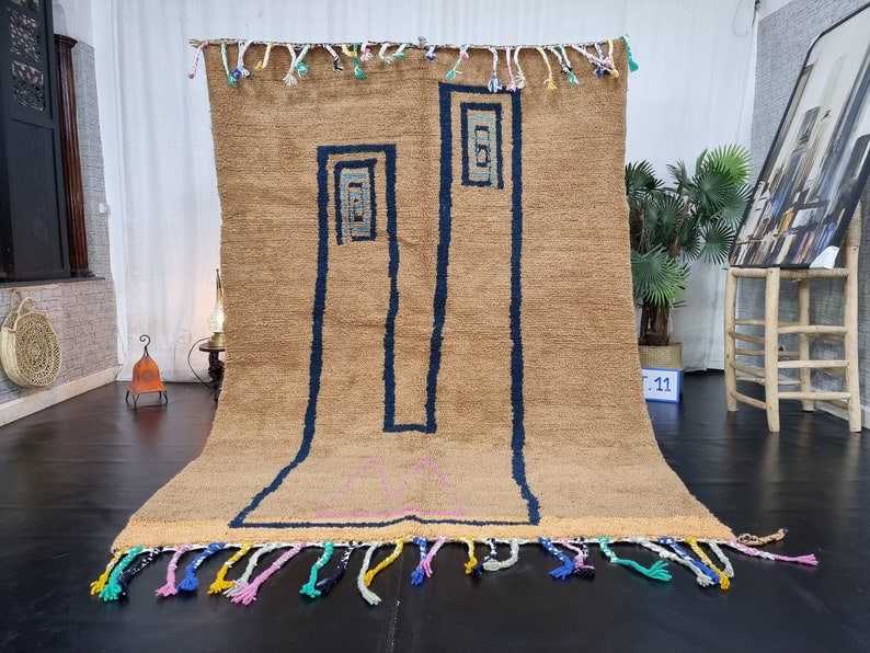Handwoven Moroccan Rug 100% Sheep Wool 8 x 5 Feet: Handwoven Moroccan Rug 100% Sheep Wool 8 x 5 Feet This fabulous authentic rug is handwoven in the Atlas Mountains by local Berber women using traditional tools and natural local wool. It showcases exq