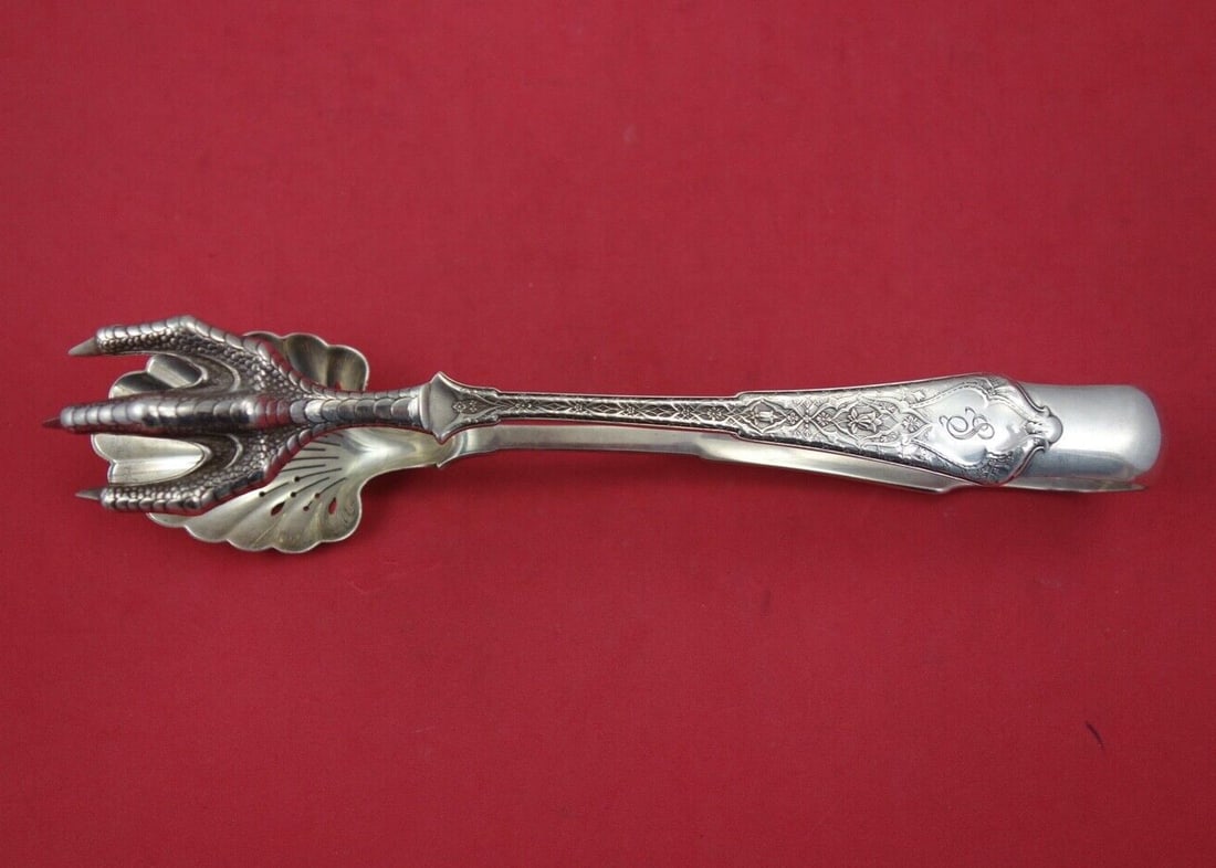 Tiffany & Co Persian Sterling Silver Ice Tong 9 1/4 inches Claw Design: Tiffany & Co Persian Sterling Silver Ice Tong 9 1/4 inches Claw Design Elegant and functional, this ice tong by Tiffany & Co. is crafted from high-quality sterling silver and features a distinctive cl