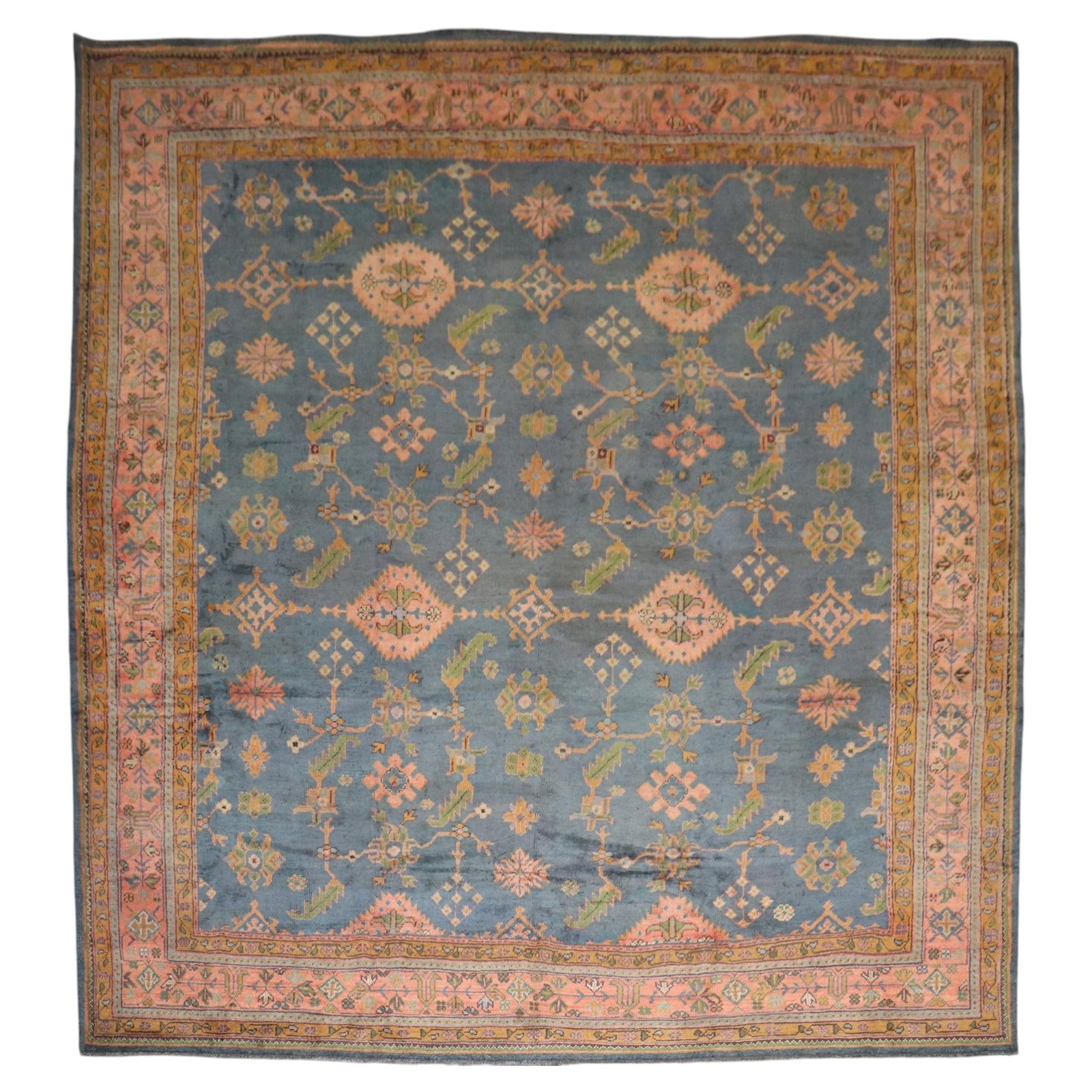 Early 20th Century Turkish Oushak Handwoven Wool Square Rug 10'6" x 11'8": Early 20th Century Turkish Oushak Handwoven Wool Square Rug 10'6" x 11'8" This early 20th century Turkish Oushak rug features a rare square shape and is hand-woven from Angora and wool. Dating to the 