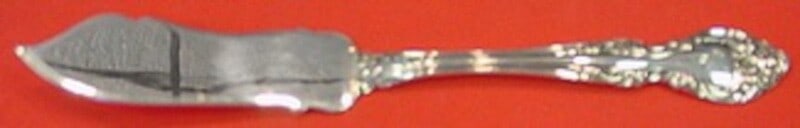 Gorham Melrose Sterling Silver 7 Inch Master Butter Knife: Gorham Melrose Sterling Silver 7 Inch Master Butter Knife Enhance your dining experience with the Melrose by Gorham Sterling Silver Master Butter Knife. This exquisite piece, measuring 7 inches, featu