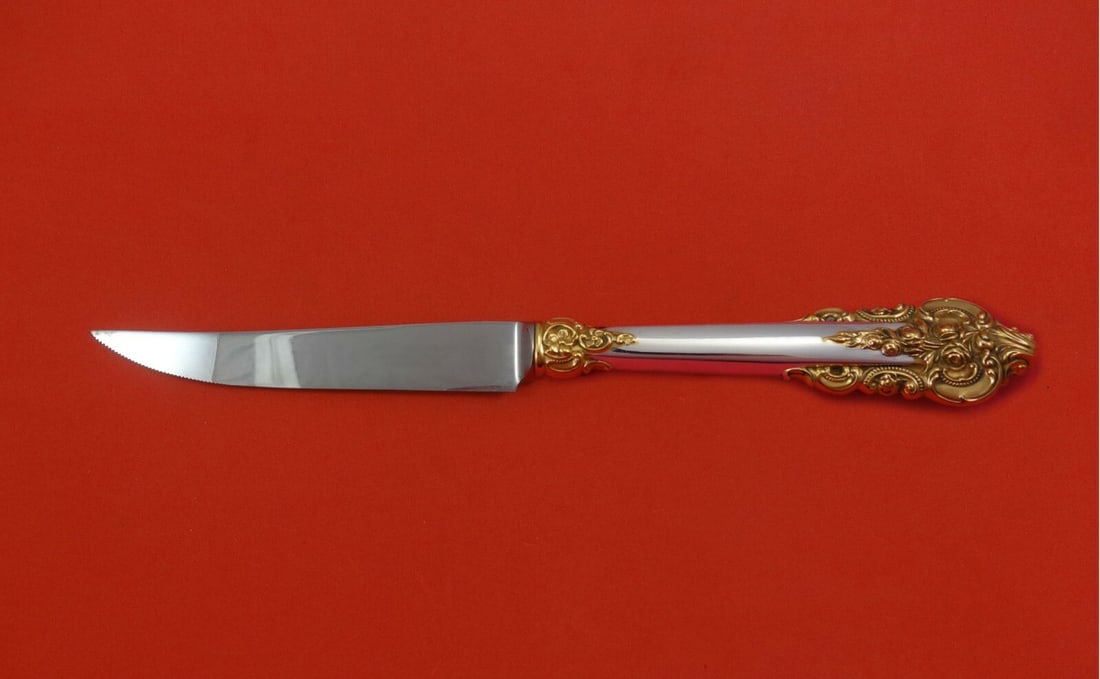 Wallace Grande Baroque Gold Accents Sterling Silver Steak Knife 8.5 inches: Wallace Grande Baroque Gold Accents Sterling Silver Steak Knife 8.5 inches Elevate your dining experience with this exquisite Grande Baroque Gold Accents steak knife by Wallace. Crafted from high-qual