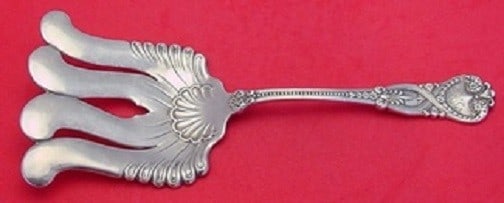 Tiffany & Co. Saint James Sterling Silver Asparagus Fork 9 5/8": Tiffany & Co. Saint James Sterling Silver Asparagus Fork 9 5/8" This exquisite asparagus fork from Tiffany & Co. features a beautifully crafted design in the classic Saint James pattern, showcasing wa