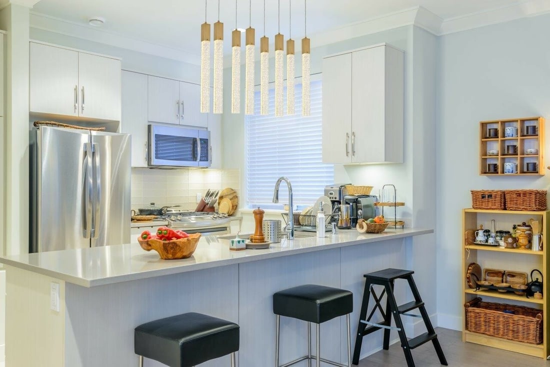 Weston 8 Light Crystal Pendant in Satin Gold 36 in: Weston 8 Light Crystal Pendant in Satin Gold 36 in Modern crystal pendant chandelier with a satin gold finish and clear seeded crystal bar accents. It is hardwired, dimmable, and height-adjustable, wi