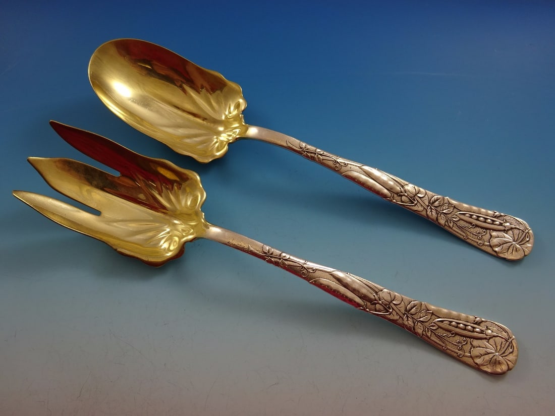 Tiffany & Co. Vine Sterling Silver Salad Serving Set Gold Washed 10": Tiffany & Co. Vine Sterling Silver Salad Serving Set Gold Washed 10" Elevate your dining experience with this exquisite Vine Salad Serving Set by Tiffany & Co. Crafted from high-quality sterling silve
