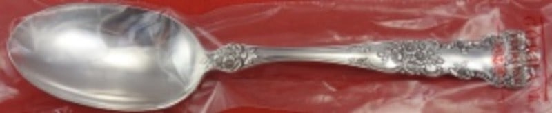 Gorham Buttercup Sterling Silver Serving Spoon 8 3/8 in Factory Sleeve: Gorham Buttercup Sterling Silver Serving Spoon 8 3/8 in Factory Sleeve Sterling silver serving spoon in the Buttercup pattern by Gorham. It is new in factory sleeve, measures 8 3/8 inches, is not mono