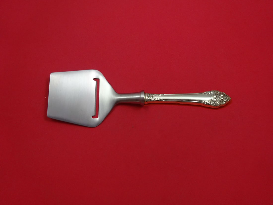 Reed & Barton Fragrance Sterling Silver Cheese Plane 8 1/4 Inch: Reed & Barton Fragrance Sterling Silver Cheese Plane 8 1/4 Inch This exquisite cheese plane by Reed & Barton features a hollow sterling silver handle and a durable stainless steel flat cutting blade, 