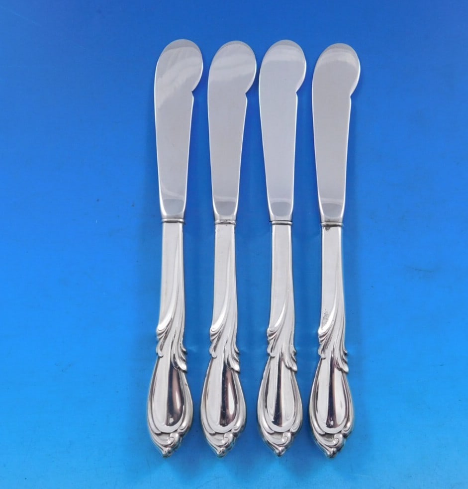 International Silver Rhapsody New Butter Spreader Set 4 pcs Sterling Silver: International Silver Rhapsody New Butter Spreader Set 4 pcs Sterling Silver Enhance your dining experience with this exquisite set of 4 butter spreaders from the Rhapsody New pattern by International 