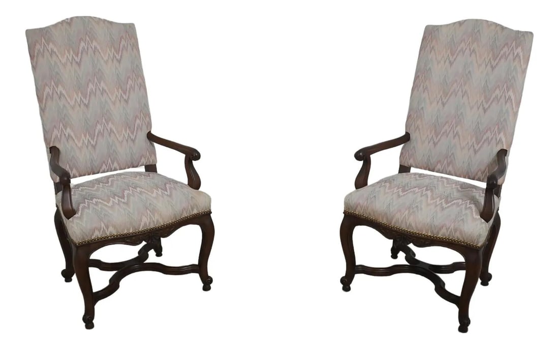 Elegant Pair of Baker French Louis XIV Upholstered Chairs: Elegant Pair of Baker French Louis XIV Upholstered Chairs This exquisite pair of French Louis XIV style upholstered chairs showcases elegant craftsmanship and timeless design. With approximately 40 ye