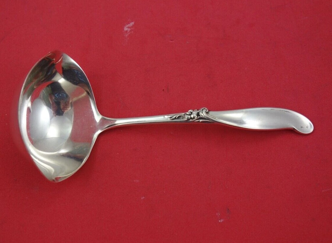 International Sterling Silver Gravy Ladle Silver Melody 6 3/8 Inch: International Sterling Silver Gravy Ladle Silver Melody 6 3/8 Inch This exquisite gravy ladle from the Silver Melody pattern by International Sterling is crafted from high-quality sterling silver. Mea