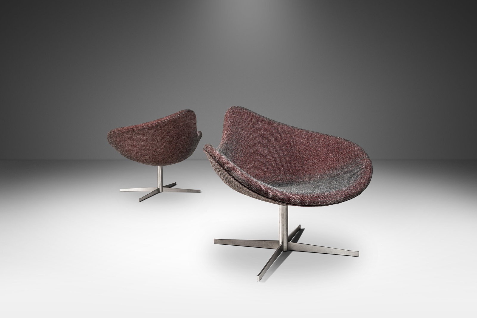 Set of 2 K2 Magenta Swivel Chairs by Busk & Hertzog for Hightower: Set of 2 K2 Magenta Swivel Chairs by Busk & Hertzog for Hightower Introducing a striking set of two "K2" chairs designed by the renowned Danish duo Flemming Busk and Stephan Hertzog. Inspired by the s