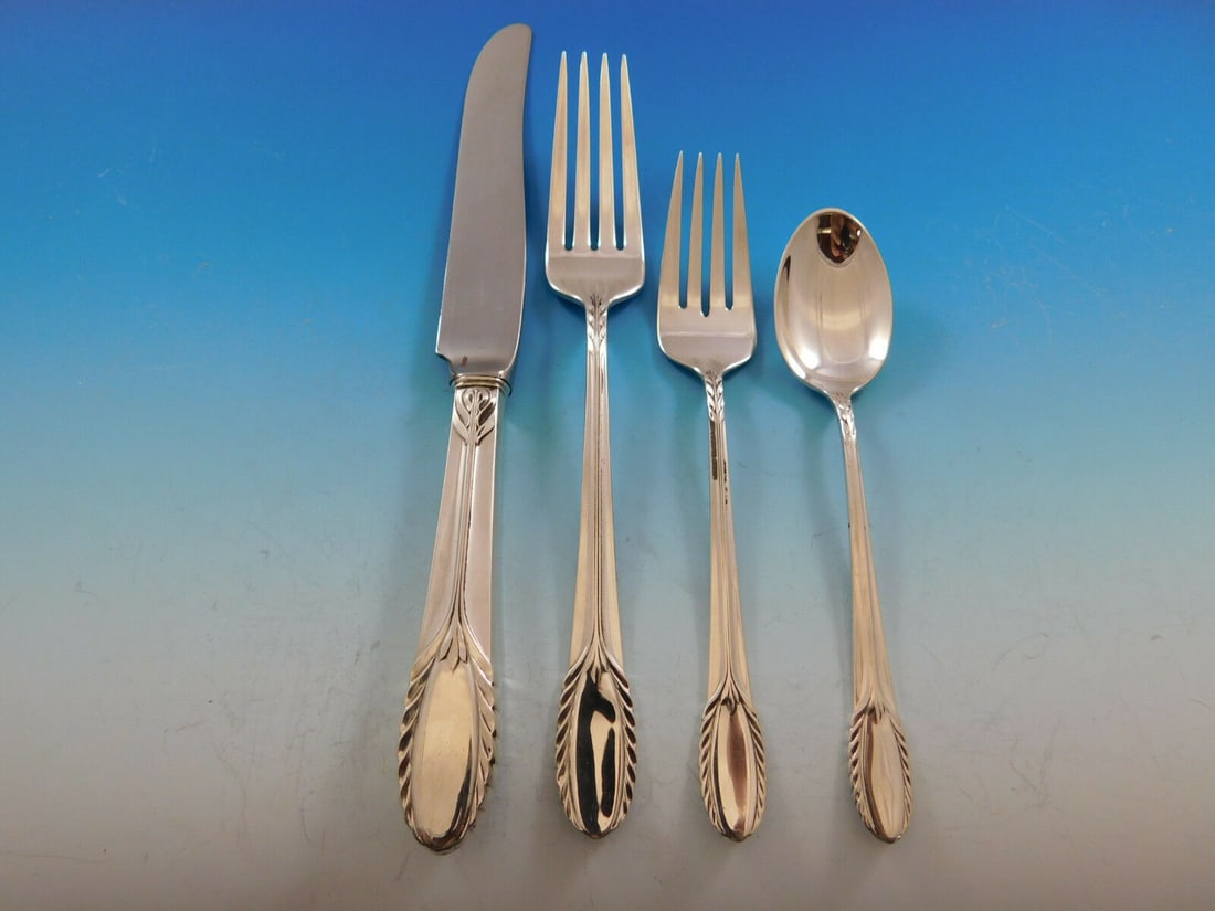 International Sterling Silver Trousseau 4pc Dinner Place Setting: International Sterling Silver Trousseau 4pc Dinner Place Setting This exquisite Trousseau dinner size place setting by International Sterling Silver offers a luxurious dining experience. Composed of h