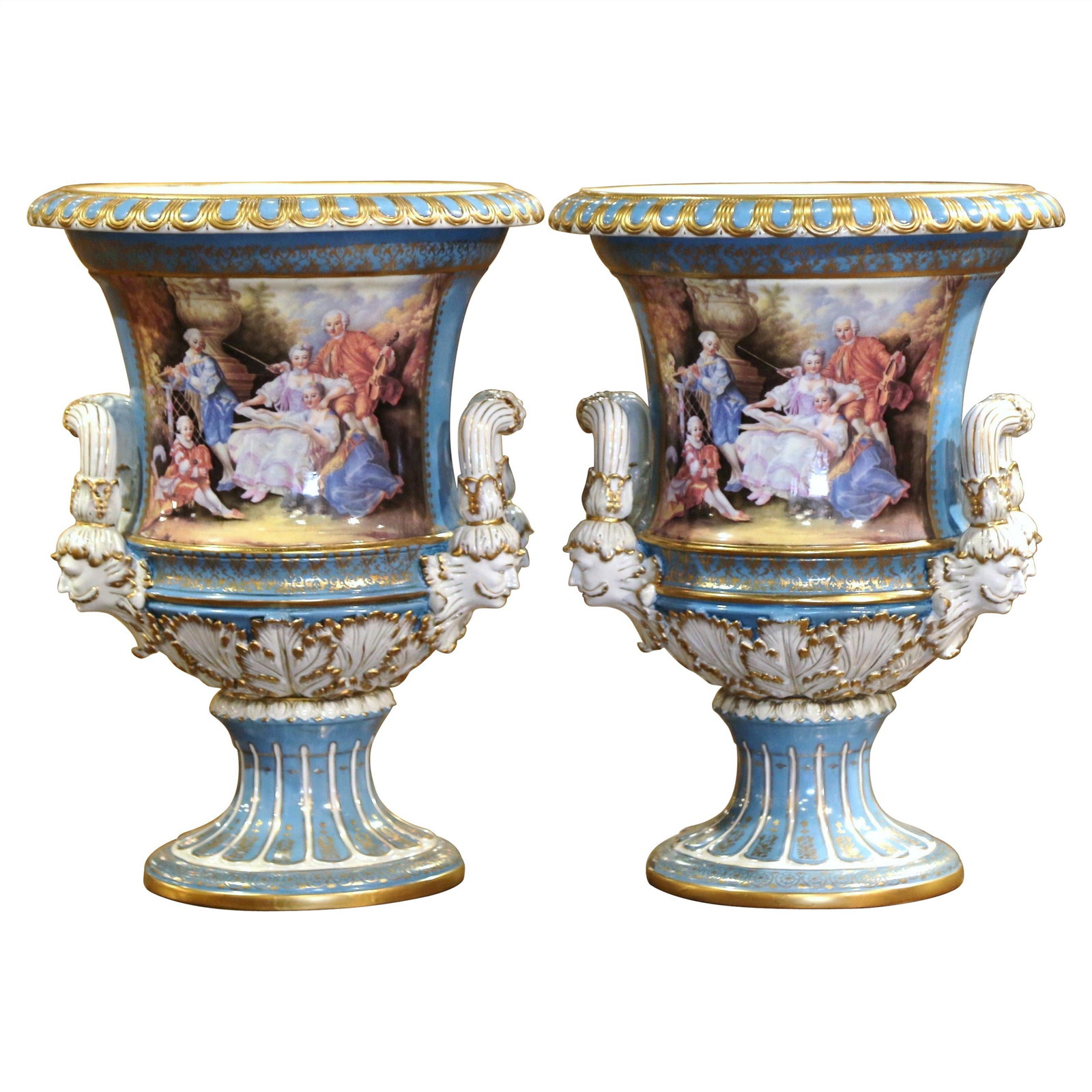 Pair of French Louis XVI Celeste Blue Porcelain Urns in Sevres Manner Gilt Accents: Pair of French Louis XVI Celeste Blue Porcelain Urns in Sevres Manner Gilt Accents This pair of large French porcelain urns, crafted circa 1950 in the Sevres style, features a vibrant Celeste blue bac