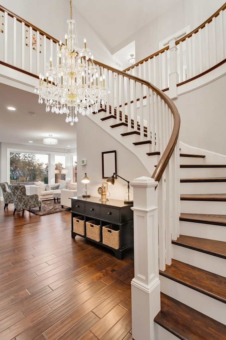 Giselle 21-Light Gold Crystal Foyer Chandelier 38 x 53: Giselle 21-Light Gold Crystal Foyer Chandelier 38 x 53 This large modern crystal chandelier features a gold frame and clear royal cut crystals in the Venetian style, designed to make a statement in en