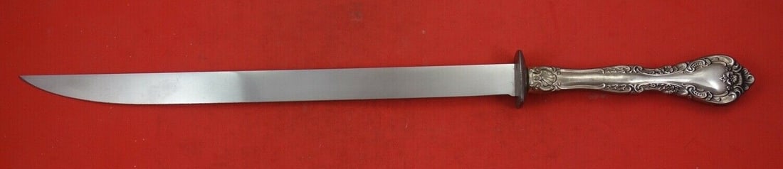 Gorham Alencon Lace Sterling Silver Roast Carving Knife 16 3/4": Gorham Alencon Lace Sterling Silver Roast Carving Knife 16 3/4" This exquisite roast carving knife features a stunning Alencon Lace pattern by Gorham. Crafted from high-quality sterling silver, this e