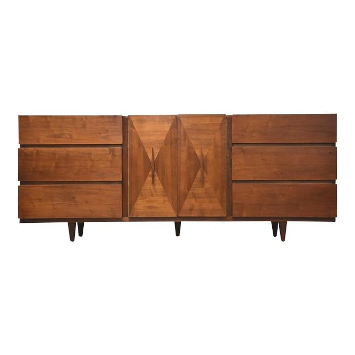 Mid Century Modern American of Martinsville Walnut Dresser 76": Mid Century Modern American of Martinsville Walnut Dresser 76" This mid-century modern walnut dresser, crafted by American of Martinsville, showcases a timeless design and a rich brown finish. It has 