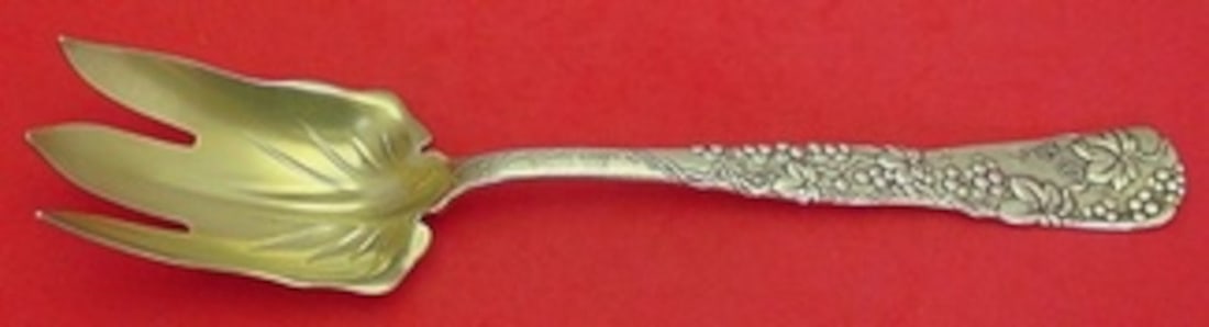 Tiffany & Co Vine Sterling Silver Salad Fork Gold Washed Grape Motif 10 1/2: Tiffany & Co Vine Sterling Silver Salad Fork Gold Washed Grape Motif 10 1/2 Sterling silver salad serving fork in the Vine pattern by Tiffany & Co. This piece features a grape motif on the handle, is 