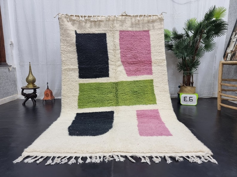 Authentic Handmade Moroccan Berber Wool Area Rug 10 x 5 Feet: Authentic Handmade Moroccan Berber Wool Area Rug 10 x 5 Feet Experience the beauty of a stunning authentic handmade Moroccan Berber wool area rug. This exquisite piece is handcrafted by local Berber w
