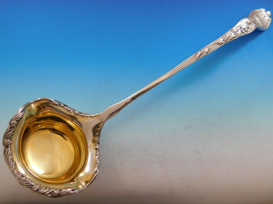 Tiffany & Co. Sterling Silver Chrysanthemum Pattern Punch Ladle with Goldwash Decoration: Tiffany & Co. Sterling Silver Chrysanthemum Pattern Punch Ladle with Goldwash Decoration This is a sterling silver punch ladle by Tiffany & Co., featuring the Chrysanthemum pattern. The ladle has a de