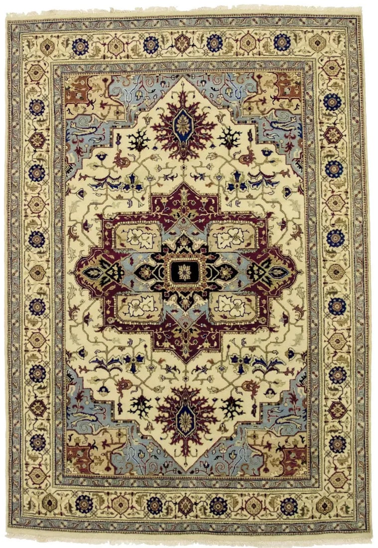 Hand-Knotted Wool Heriz Serapi Area Rug 5'6 x 7'11 Geometric Design: Hand-Knotted Wool Heriz Serapi Area Rug 5'6 x 7'11 Geometric Design This vintage-style Heriz Serapi rug features a geometric pattern in cream, brick red, light blue, dark navy, olive, and rust tones. 