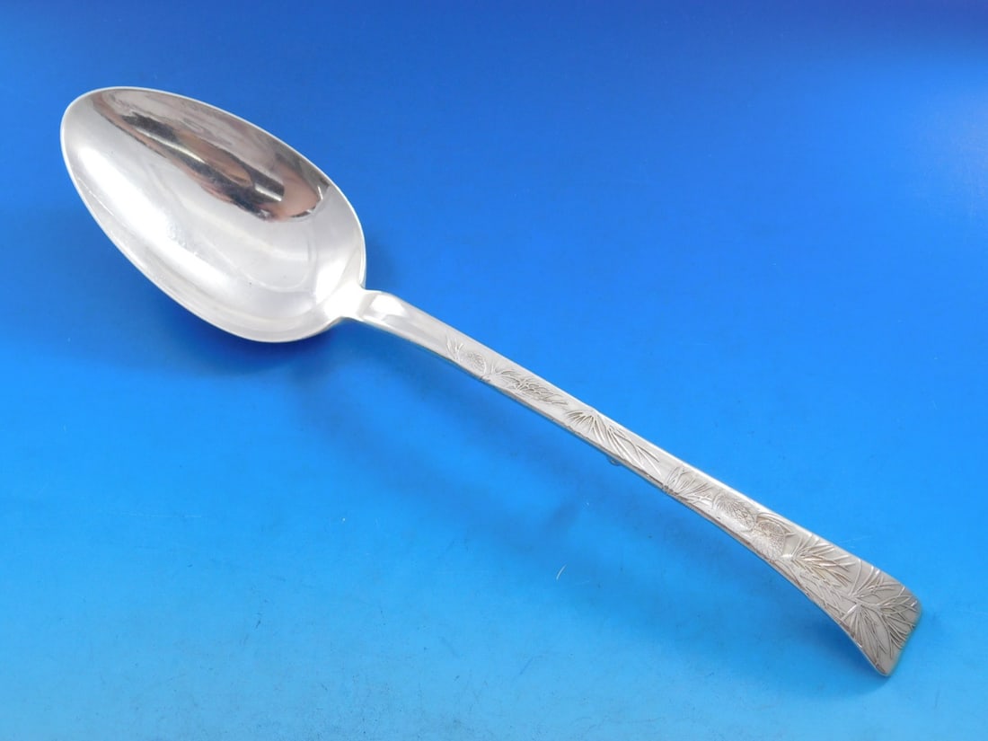 Tiffany Sterling Silver 11 Inch Lap Over Edge Stuffing Spoon with Pine Cones: Tiffany Sterling Silver 11 Inch Lap Over Edge Stuffing Spoon with Pine Cones This exquisite Lap Over Acid Etched Stuffing Spoon by Tiffany & Co. showcases a stunning design featuring intricate pine co