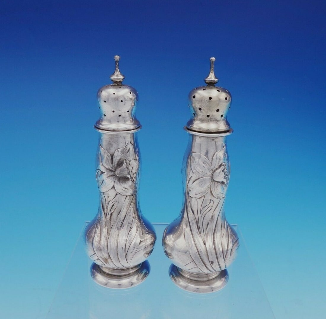 Gorham Daffodil Sterling Silver Salt and Pepper Shaker Set 2-Piece: Gorham Daffodil Sterling Silver Salt and Pepper Shaker Set 2-Piece Elevate your dining experience with this exquisite Daffodil Sterling Silver Salt and Pepper Shaker Set by Gorham. The elegant design 