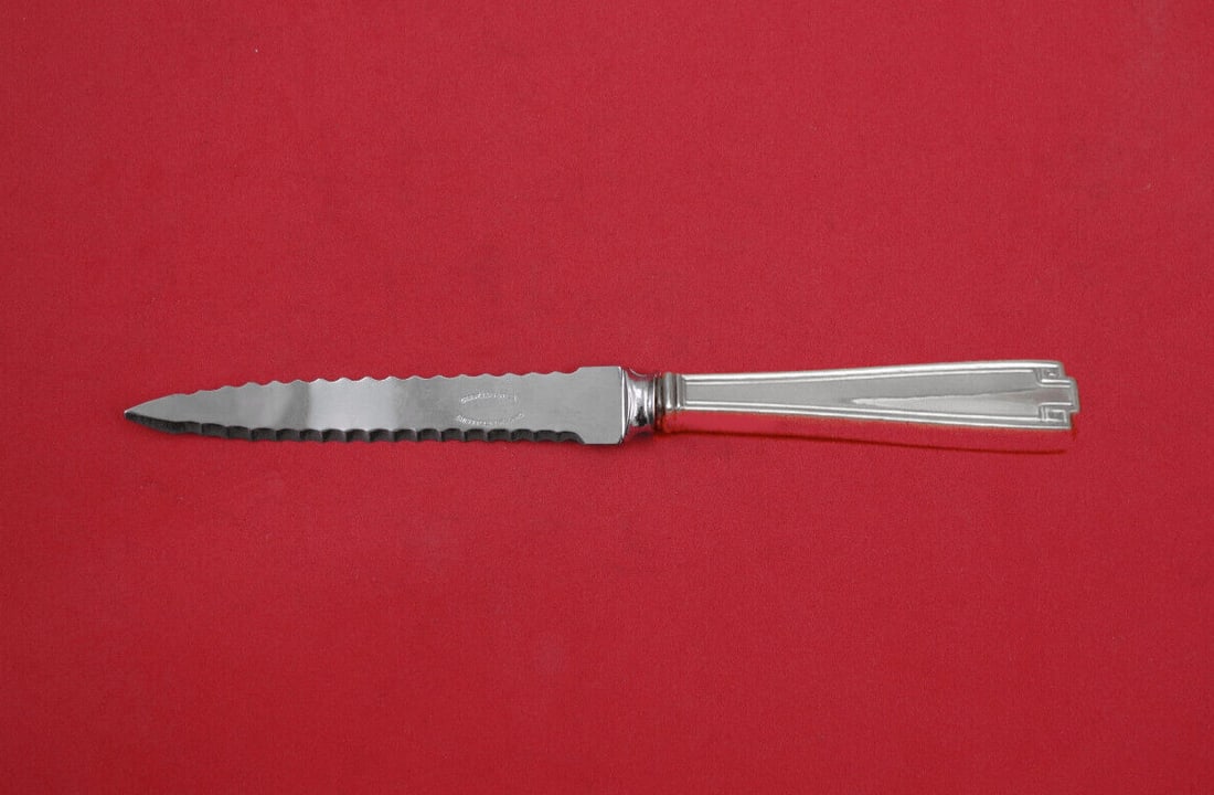 Gorham Etruscan Sterling Silver Custom Grapefruit Knife 7 3/4": Gorham Etruscan Sterling Silver Custom Grapefruit Knife 7 3/4" Discover the elegance of the Etruscan pattern by Gorham with this custom-made grapefruit knife. Crafted from high-quality sterling silver