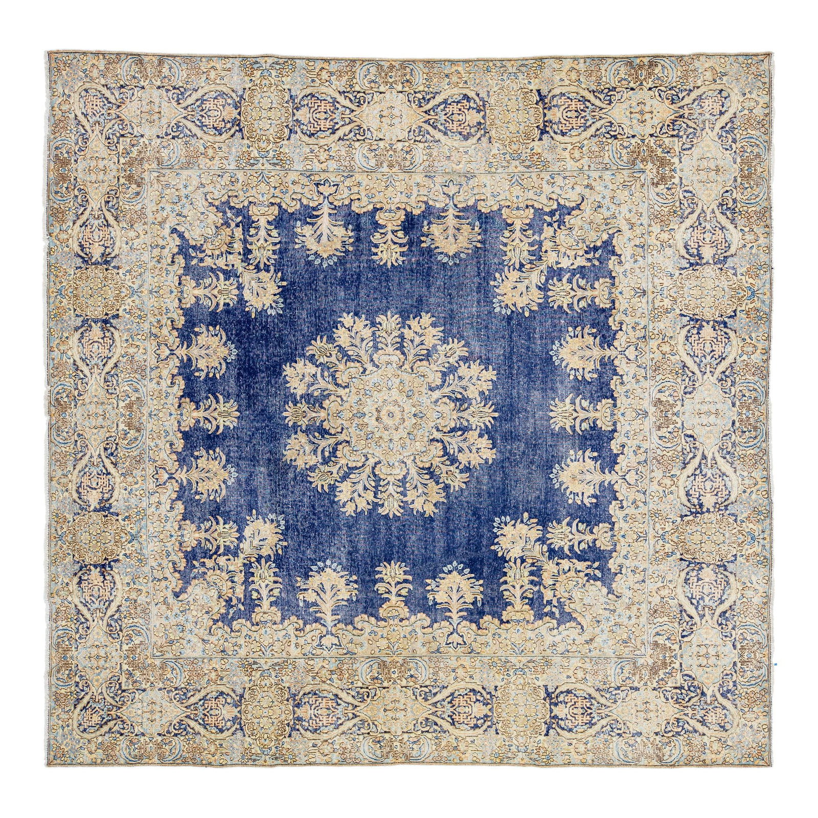 Antique Persian Kerman Wool Rug 9'9 x 9'11 Blue Floral Design: Antique Persian Kerman Wool Rug 9'9 x 9'11 Blue Floral Design This exquisite late 19th-century Persian Kerman wool rug features a stunning all-over floral design in beige, yellow, and peach hues set a