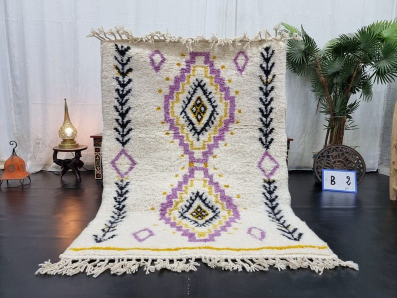 Handmade White Moroccan Berber Wool Area Rug 5 x 3.28 Feet: Handmade White Moroccan Berber Wool Area Rug 5 x 3.28 Feet This Elegant Authentic Soft White Handmade Moroccan Berber Wool Area Rug showcases exquisite craftsmanship. Handwoven in the Atlas Mountains 