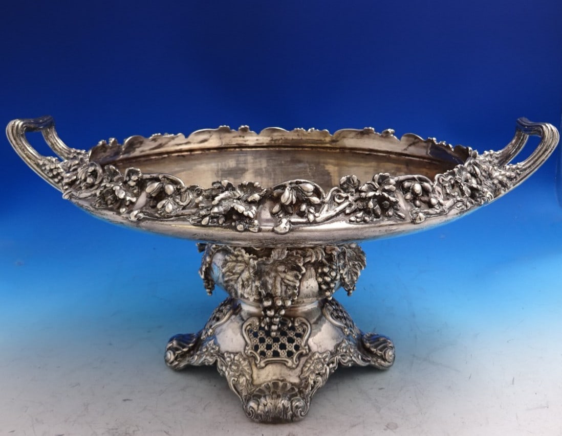 Sterling Silver Vine Pattern Centerpiece Bowl with Handles by Tiffany & Co Grapes Motif: Sterling Silver Vine Pattern Centerpiece Bowl with Handles by Tiffany & Co Grapes Motif This centerpiece bowl by Tiffany & Co. features the renowned Vine pattern in sterling silver, showcasing a detai